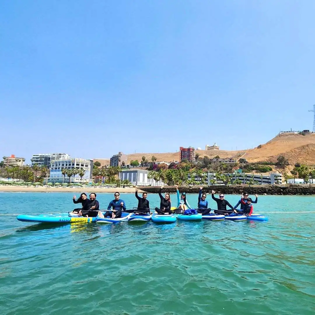 equipo instructores stand up paddle aloha peru